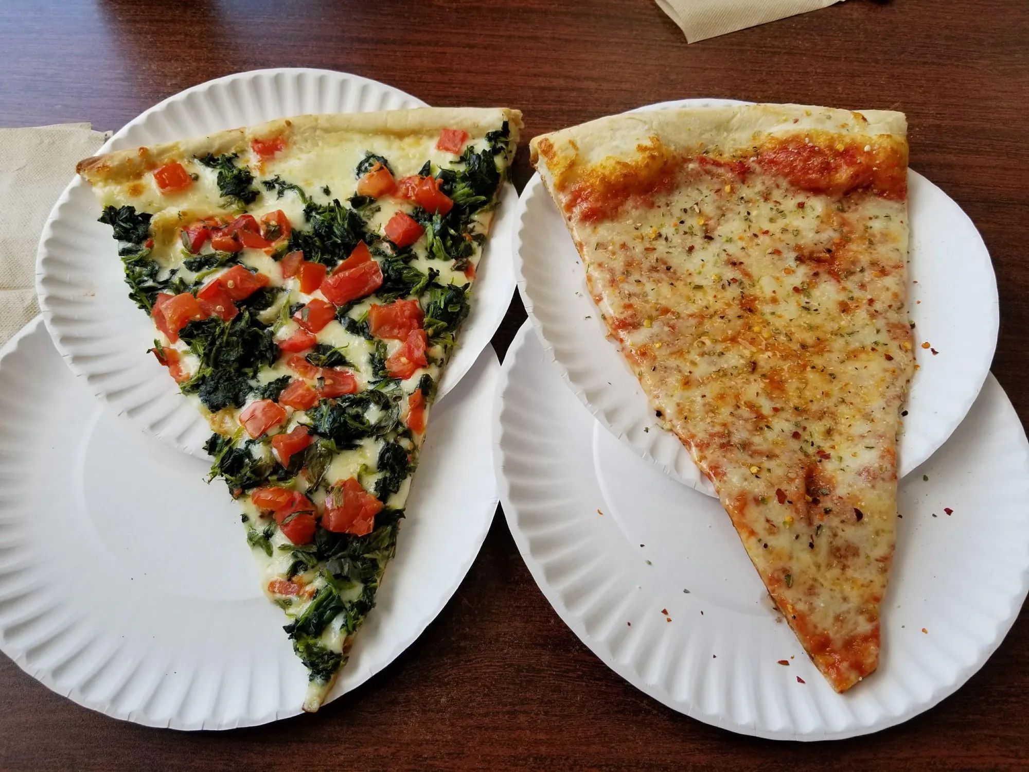 Spinach & Tomato and a Plain Cheese from Zetti's Pizza